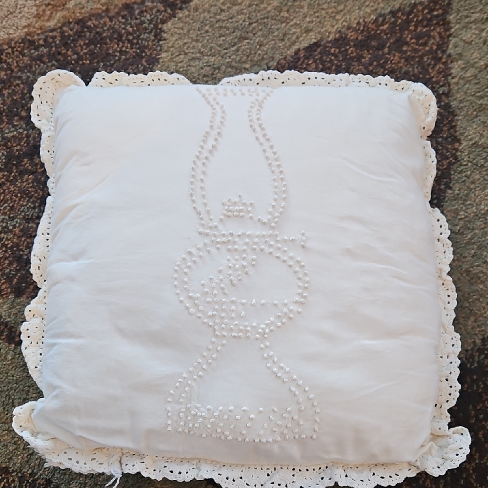 Ivory hand embroidered pillow with lace trim